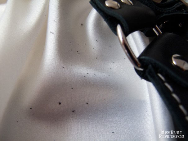 The harness gives off leather fragments